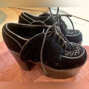Black velvet platforms with bat wings